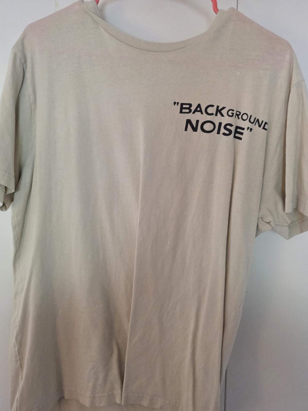 Source Unknown Cream Short Sleeve Tee with "BACKGROUND NOISE" Graphic